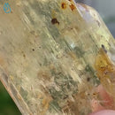 Yellow Triphane "Tabby" Enhydro with Garnet